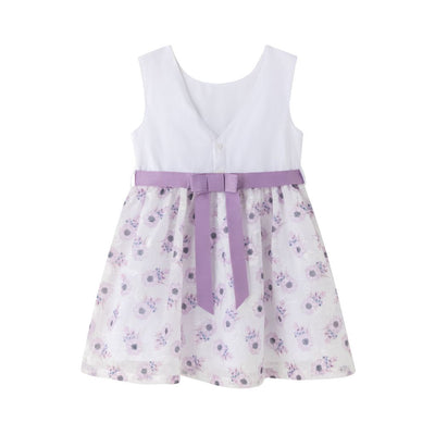 VESTIDO DE NIÑA CON TONOS LILAS. DETALLE DE CINTA EN LA CINTURA