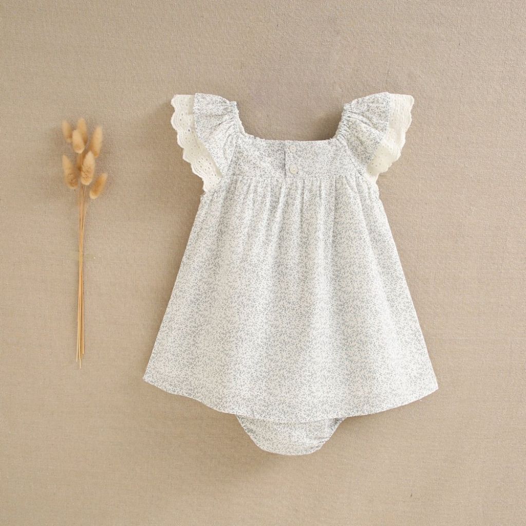 VESTIDO DE BEBÉ NIÑA CON BRAGUITA. ESTAMPADO DE HOJAS GRISES