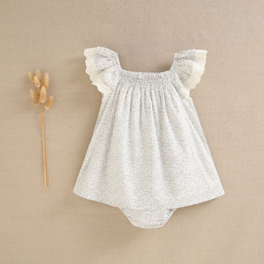VESTIDO DE BEBÉ NIÑA CON BRAGUITA. ESTAMPADO DE HOJAS GRISES