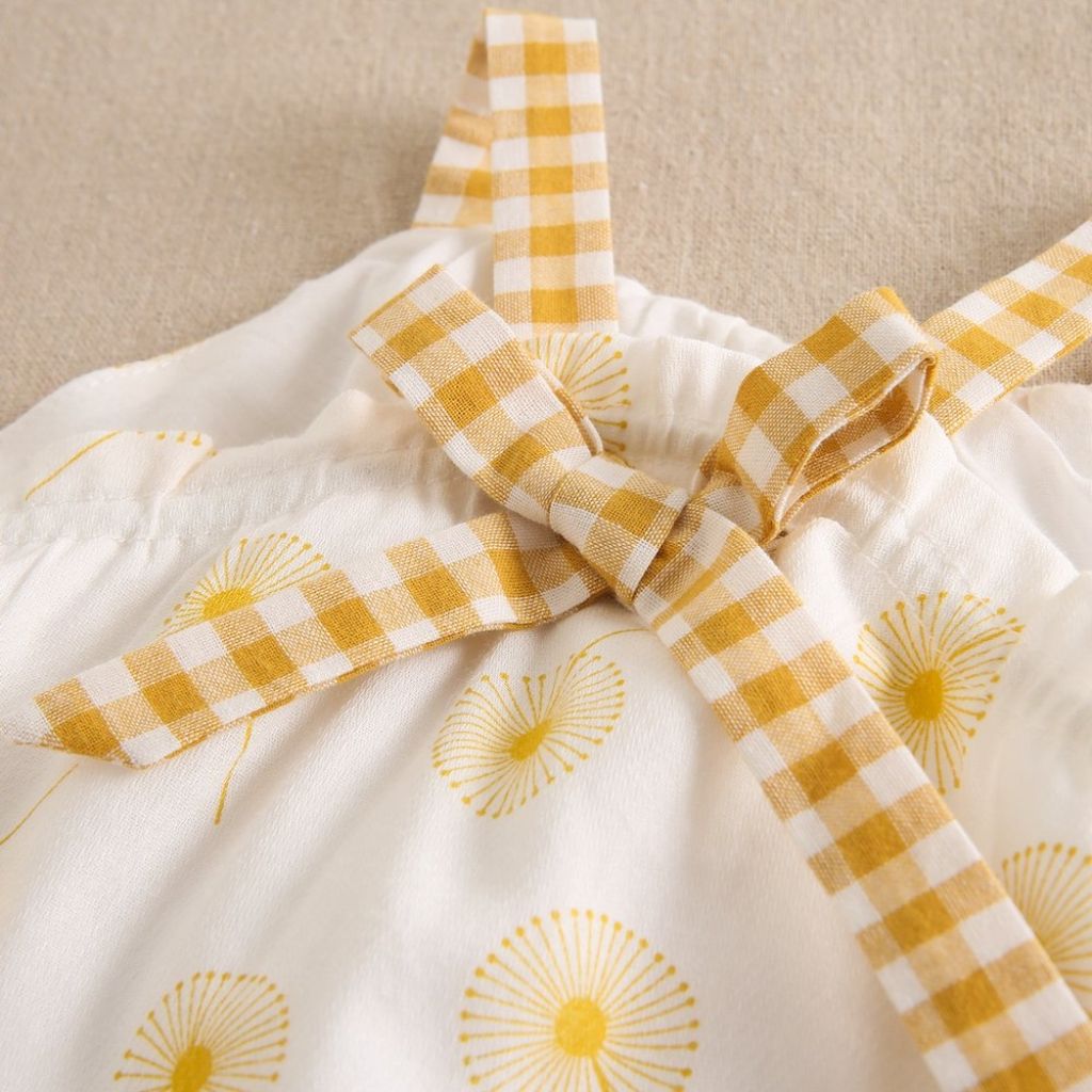 JESUSITO DE BEBÉ NIÑA CON ESTAMPADO DIENTE DE LEÓN EN MOSTAZA