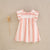 VESTIDO DE NIÑA ESTAMPADO DE RAYAS EN TONOS CORAL