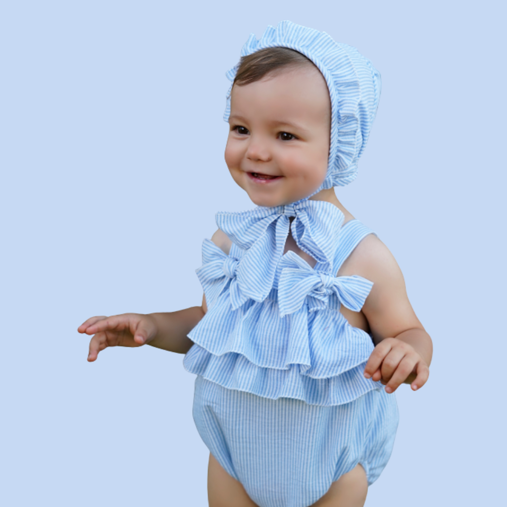 PELELE BEBÉ NIÑA CELESTE LINEAS