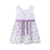 VESTIDO DE NIÑA CON TONOS LILAS. DETALLE DE CINTA EN LA CINTURA