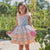 VESTIDO DE NIÑA EN AZUL CIELO Y NARANJA